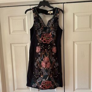 Moulinette Soeurs Black Dress with Colorful Floral Patterns